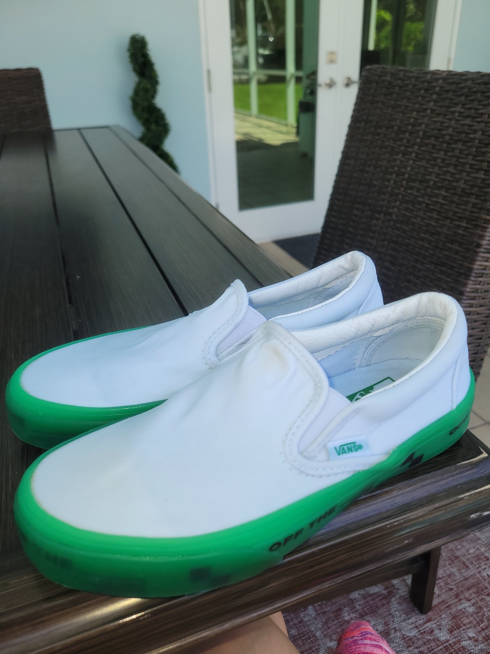 Vans Of The Wall Unisex Classic Slip-On Sneakers in White with Green Sole